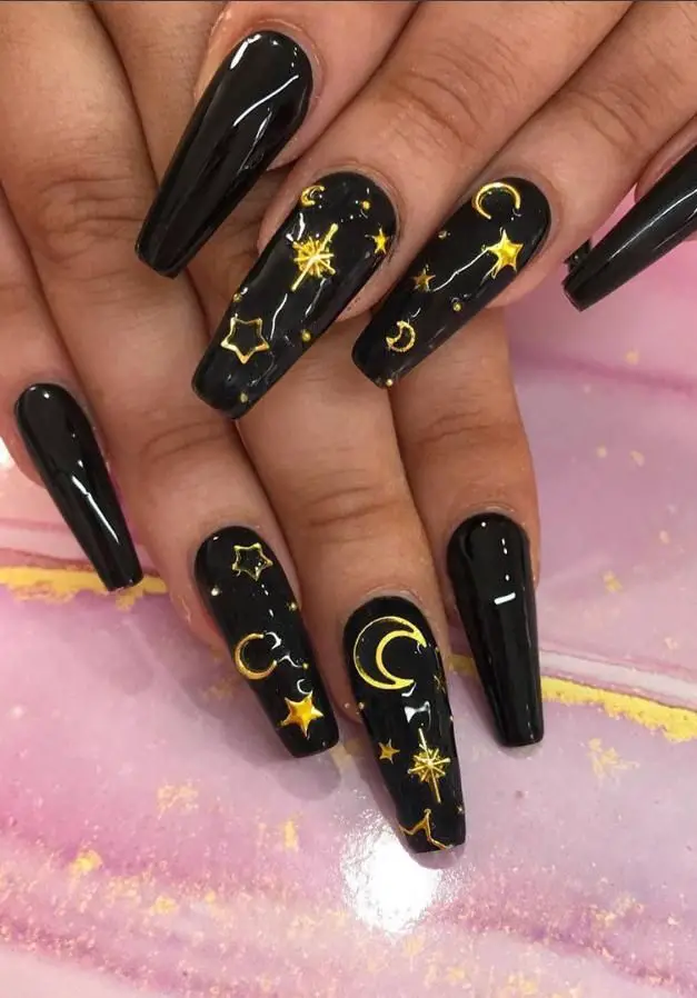 black and gold galaxy nail designs
