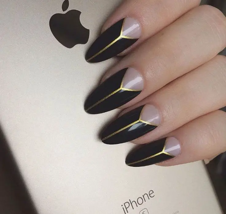 Black and gold negative space nail designs