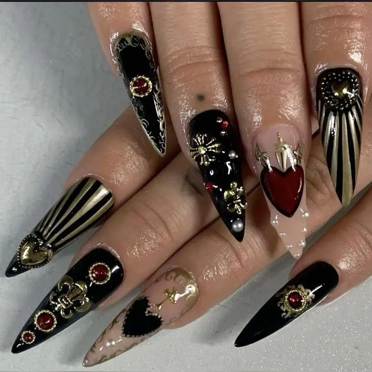 Premium Photo | A woman's nails with a silver and black nail art design