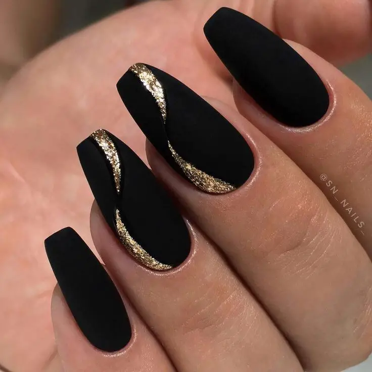 Matte black and gold nails