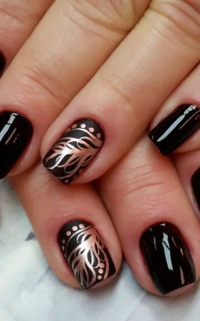 Black and gold feather nail designs