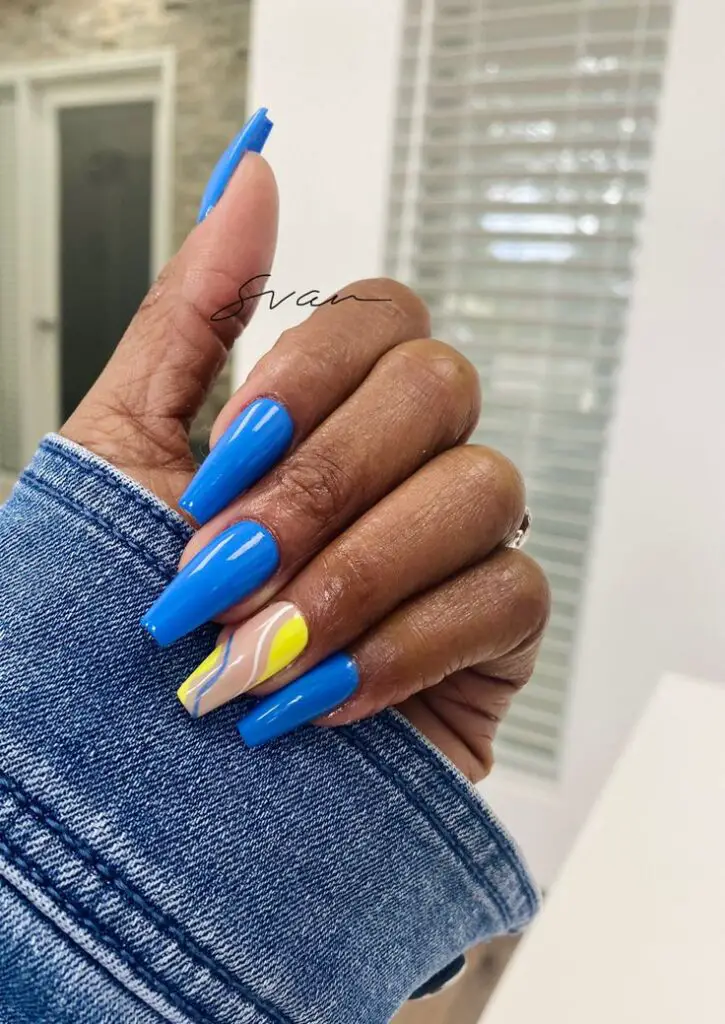 Yellow Nails with Blue Swirls