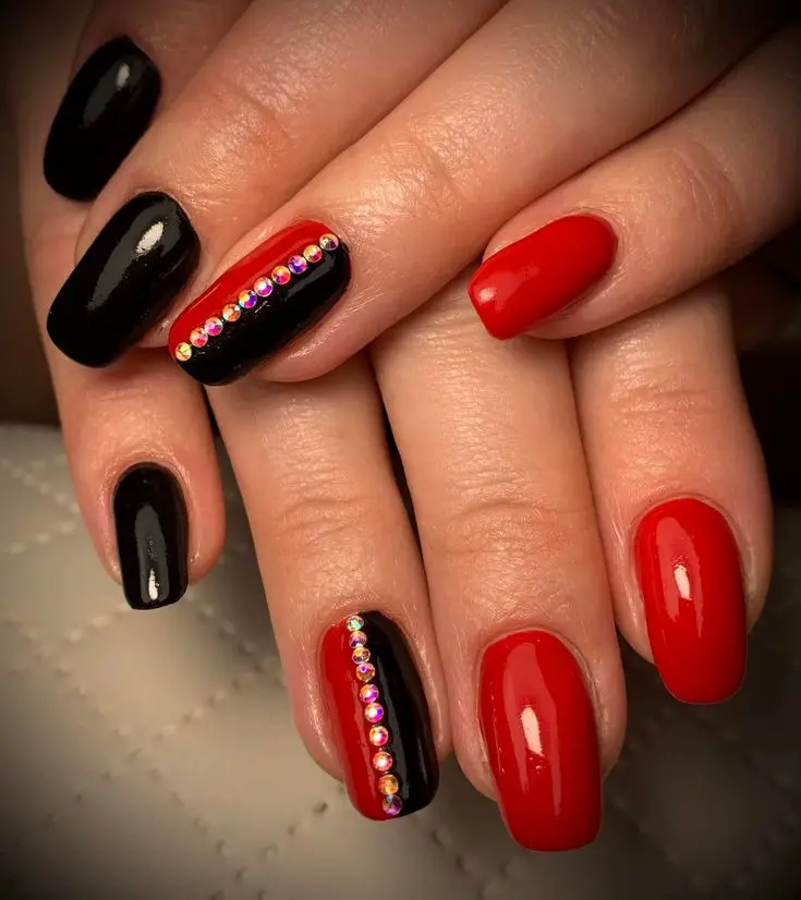 Black and red nails with rhinestone