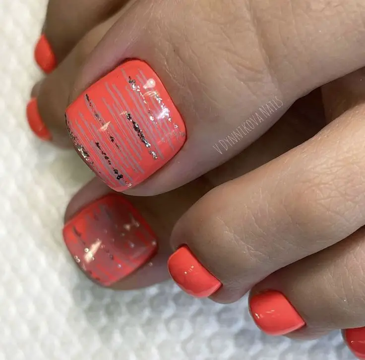 Coral and silver pedicure