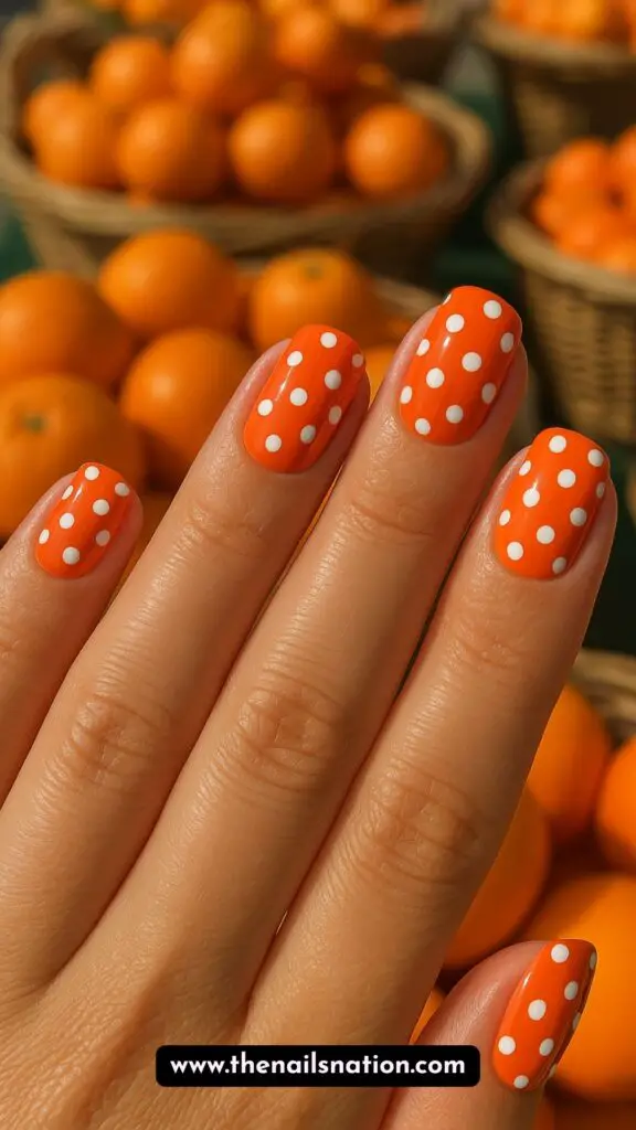 Orange Nails Design with Polka Dots