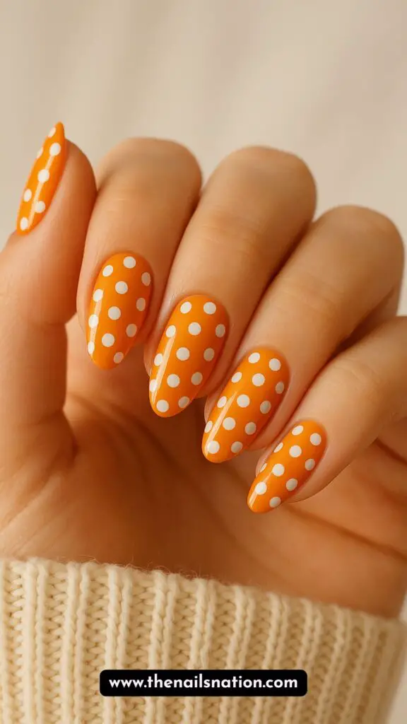 Orange Nails Design with Polka Dots design