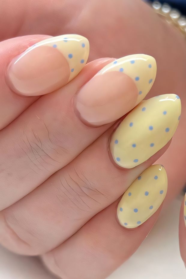 butter yellow nails with polka dots