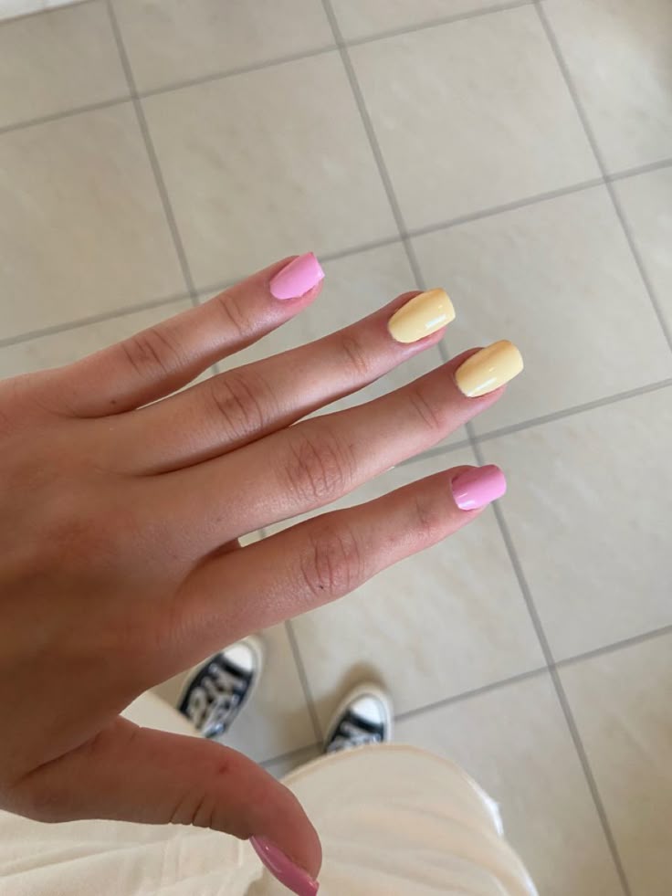 Butter yellow and pink nails