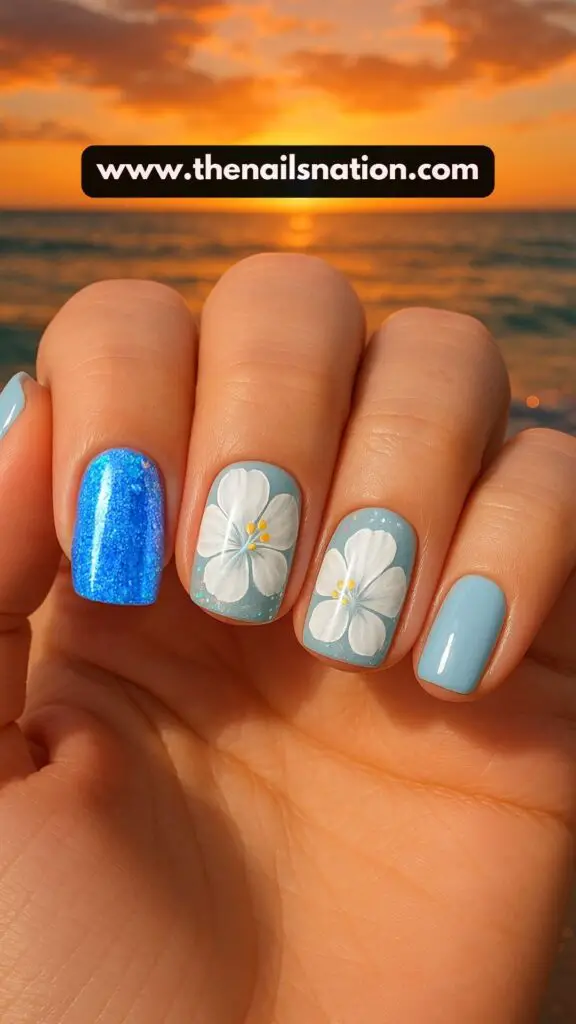 Blue Hibiscus Flower Nails with Glitter
